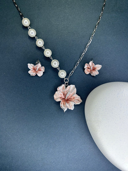 Pink Jewelry set with floral earrings and necklace with white pearls and flower